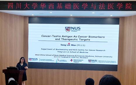 A person standing at a podium giving a presentationDescription automatically generated A person standing at a podium giving a presentationDescription automatically generated